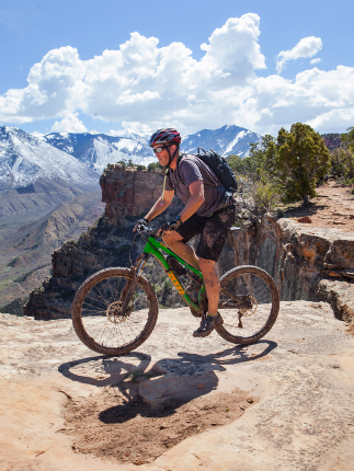 Mountain Biker on Porcupine Rim Trail in Moab Utah